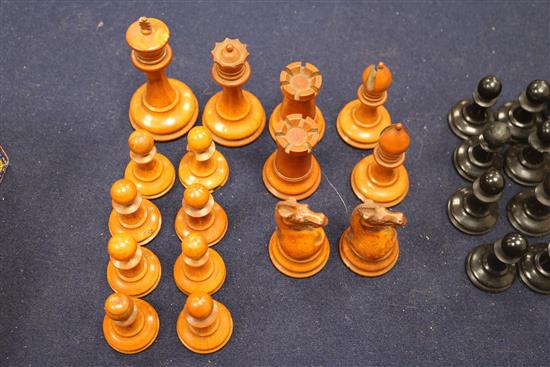 A Jaques Staunton boxwood and ebony chess set, knights and rooks stamped with a crown and the white king kings 8.5cm